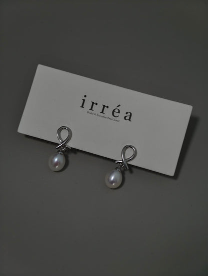 Infinite Knot Pearl Drops