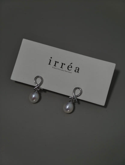 Infinite Knot Pearl Drops
